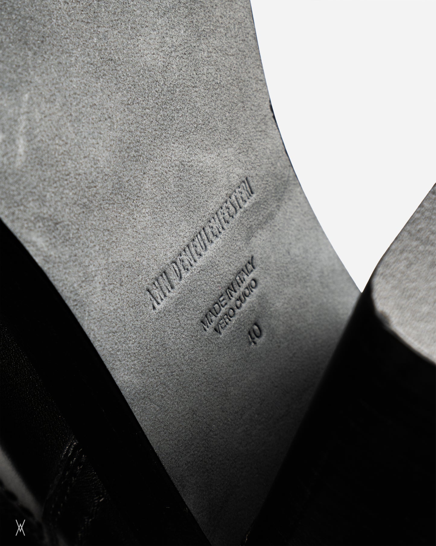 Black leather lace-up ankle boots